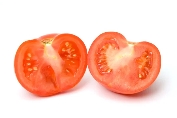 Tomato slices, lobules on the white — Stock Photo, Image