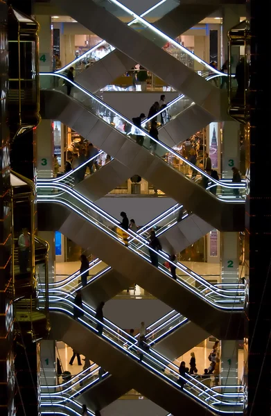 Escalators inside shopping mall Stock Photo by ©allensima 21856745