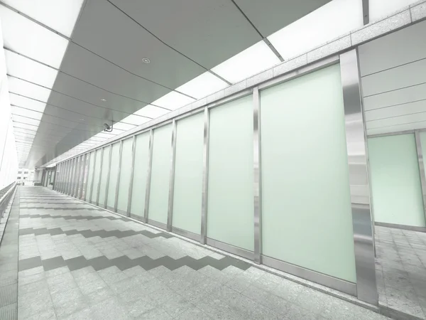Long walkway and glass wall — Stock Photo, Image