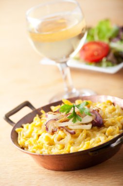 Bavarian spaetzle noodles with cheese clipart