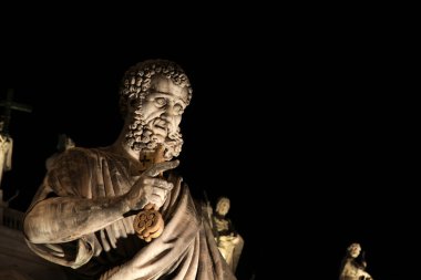 Statue of St. Peter at Night clipart