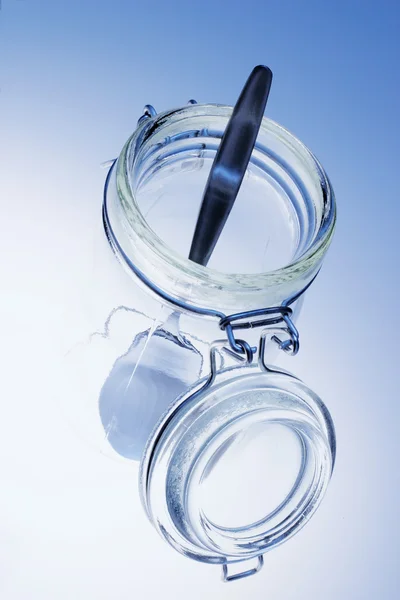 Colher em frasco de vidro — Fotografia de Stock