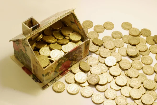 Toy House and Coins — Stock Photo, Image