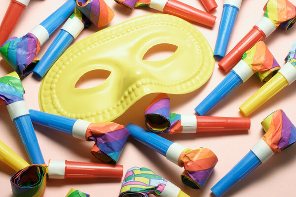 Close Up of Face Mask and Party Blowers