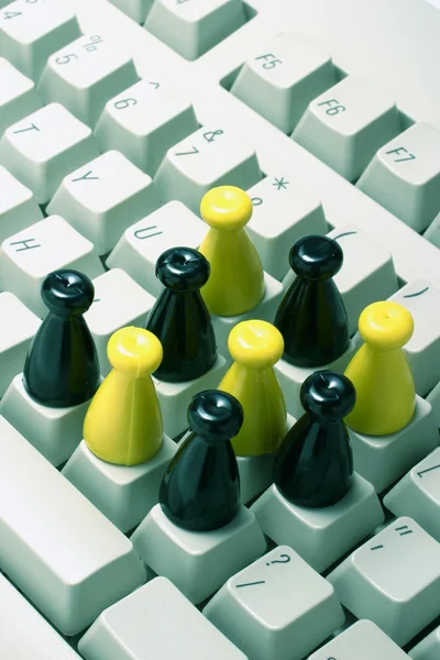 Peças de xadrez no teclado — Fotografia de Stock