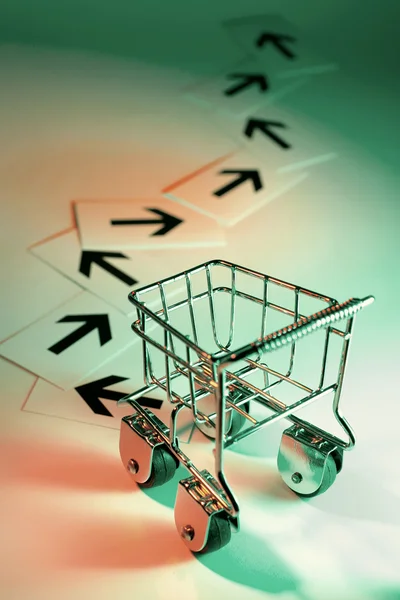 Shopping Trolley with Arrows — Stock Photo, Image
