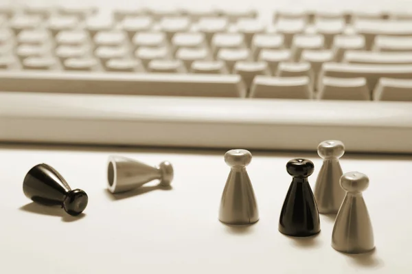 Game Pieces and Computer Keyboard — Stock Photo, Image