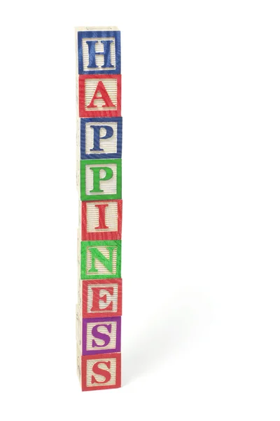 Μπλοκ αλφάβητο - ευτυχία — Φωτογραφία Αρχείου