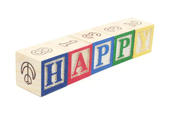 Алфавитные блоки - Happy — стоковое фото