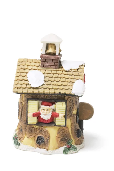 Figura de Santa e ornamento da casa de Natal — Fotografia de Stock