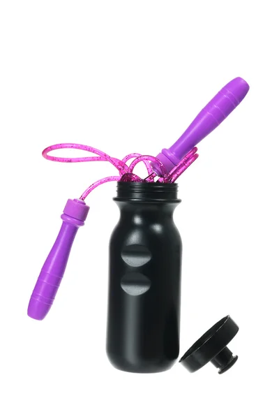 Pulando corda e plástico Flask — Fotografia de Stock