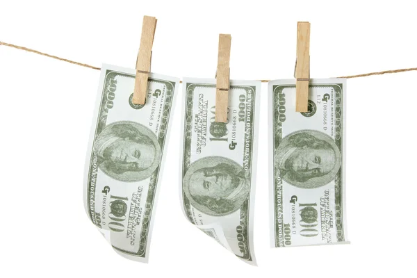 Tvättlina med dollar sedlar — Stockfoto