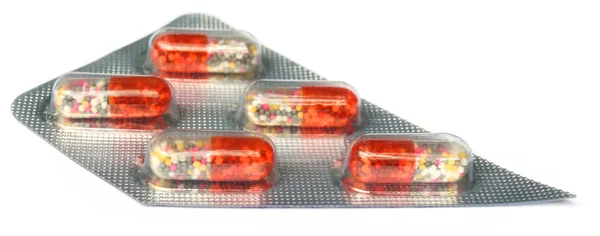 Close up of capsules packed on blister foil — Stock Photo, Image