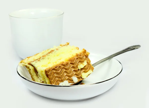 Bułka z masłem z filiżanki herbaty — Zdjęcie stockowe