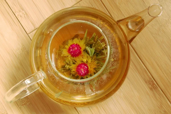 Flower tea in glass pot — Stock Photo, Image