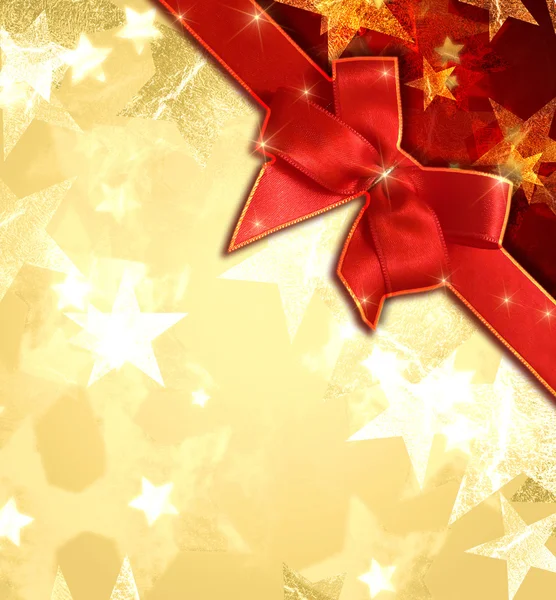 Golden stars with red ribbon — Stock Photo, Image