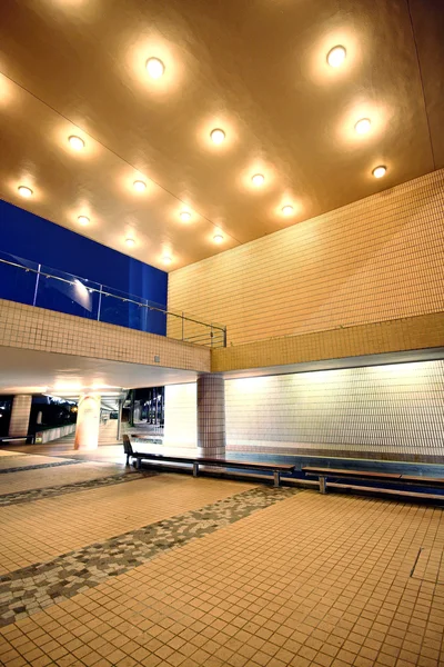 Modern hall in city downtown night — Stock Photo, Image