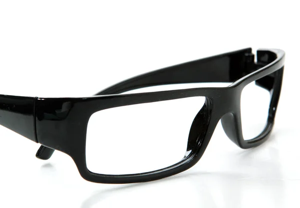 Beyaz arkaplanda siyah gözlük — Stok fotoğraf
