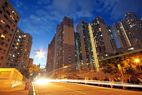Modern urban city at night with freeway traffic — Stock Photo, Image