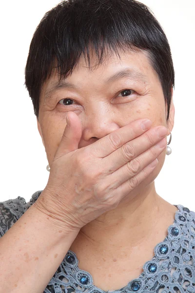 Stara kobieta, obejmujące jej usta — Zdjęcie stockowe
