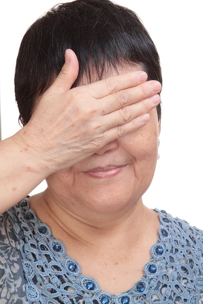 Asia mujer cegando sus ojos a mano — Foto de Stock