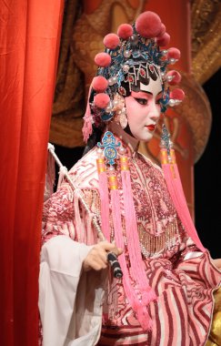 Chinese opera dummy and red cloth as text space ,it is a toy,not clipart