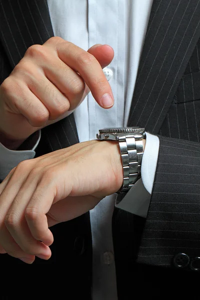 Men's hand with a watch. — Stock Photo, Image