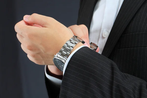 Men's hand with a watch. — Stock Photo, Image