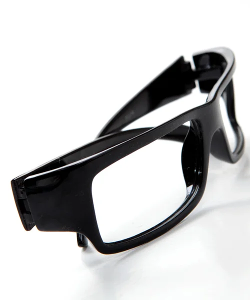 Schwarze Brille auf weißem Hintergrund — Stockfoto