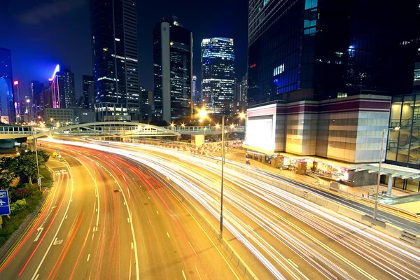 Colorful city night with lights of cars motion blurred in hong k — Stock Photo, Image