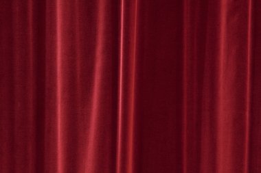 Red background texture that looks like a silky fabric or curtain clipart