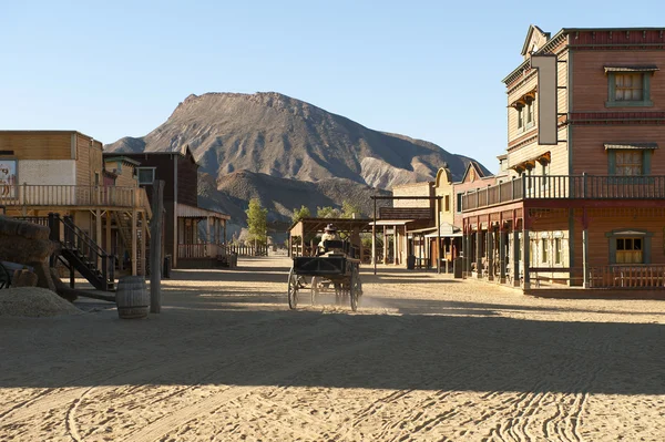 Cowboy driving a wagon at the Mini Hollywood Movie Set — Stock Photo, Image
