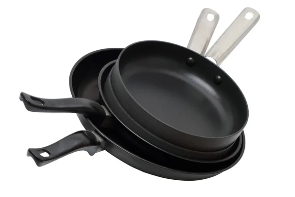 Four frying pans — Stock Photo, Image