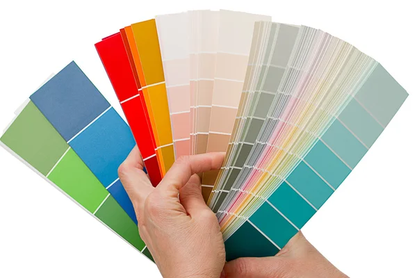 Hands on choosing color swatches — Stock Photo, Image