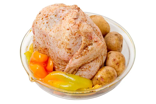 Kyllingkadaver med grønnsaker – stockfoto