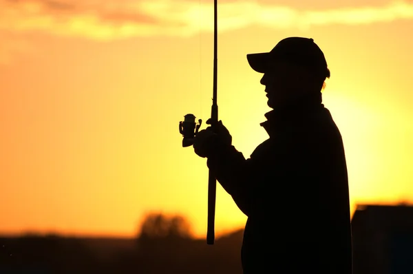 Balıkçı siluet — Stok fotoğraf