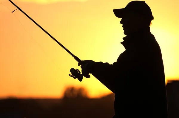 Silueta de pescador — Foto de Stock
