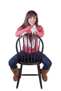 Artistic Image of a Woman Sitting on a Chair clipart