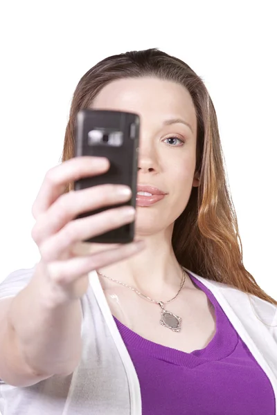 Жінка фотографує зі свого мобільного телефону — стокове фото