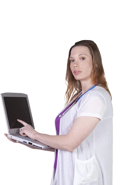 Hermoso doctor sosteniendo un ordenador portátil — Foto de Stock