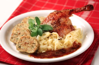 Roast Duck with Cabbage and Bread Dumplings clipart