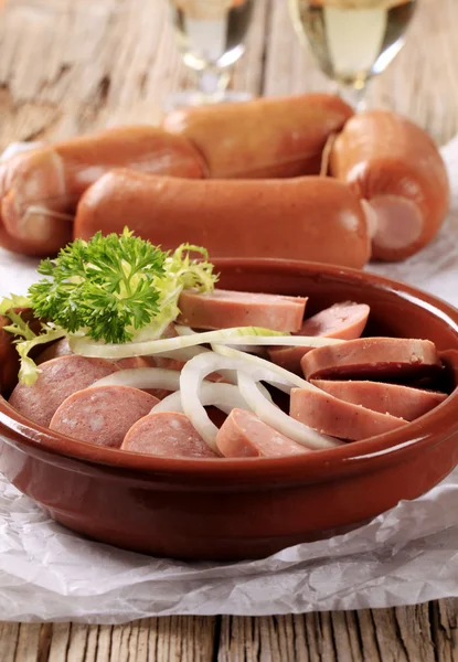 Sliced sausages and onion — Stock Photo, Image