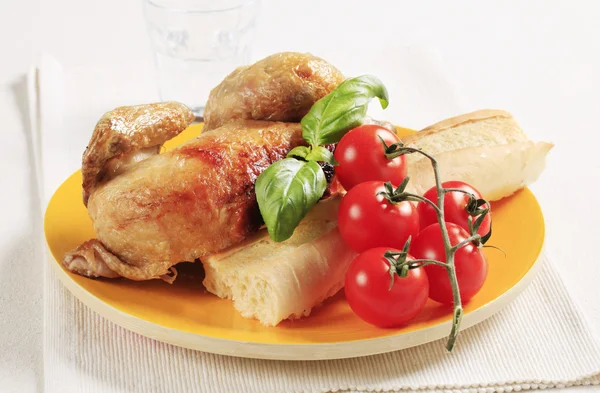 Roast chicken and crispy baguette — Stock Photo, Image