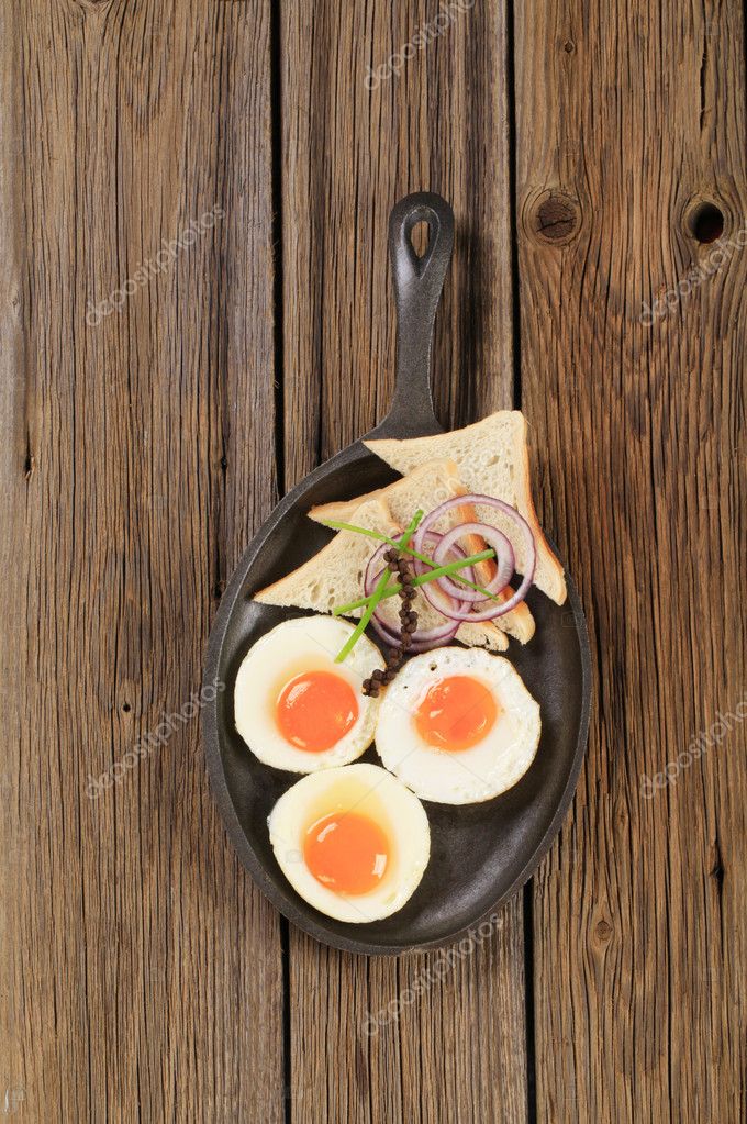 Fried eggs and bread — Stock Photo © ajafoto #7297088