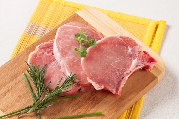 Raw pork chops — Stock Photo, Image