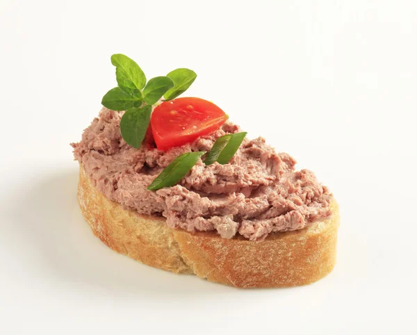 Toasted bread and meat spread — Stock Photo, Image