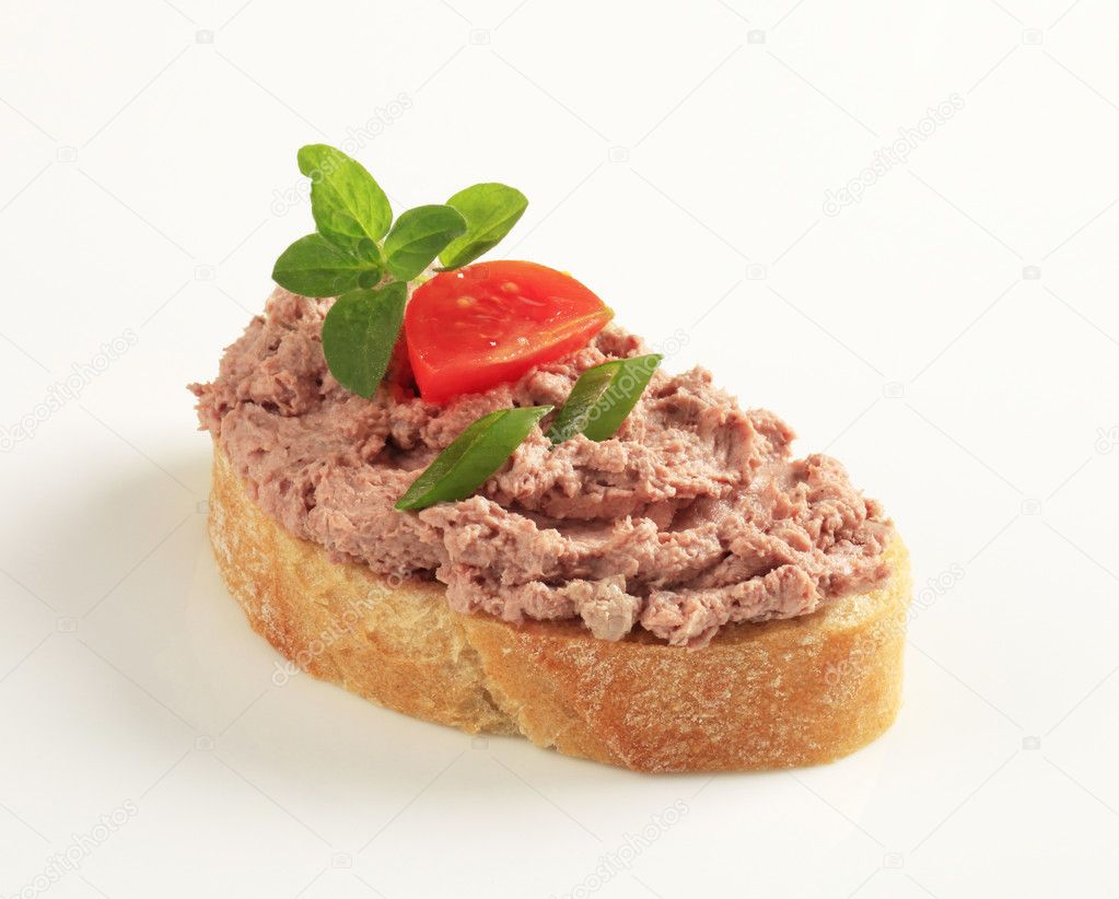 Toasted bread and meat spread