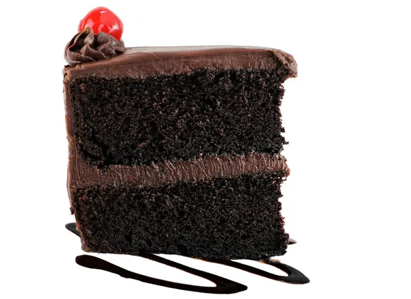 Chocolate cake with chocolate icing and a cherry. — Stock Photo, Image