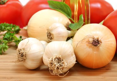 Garden fresh garlic, onions, tomatoes and parsley clipart