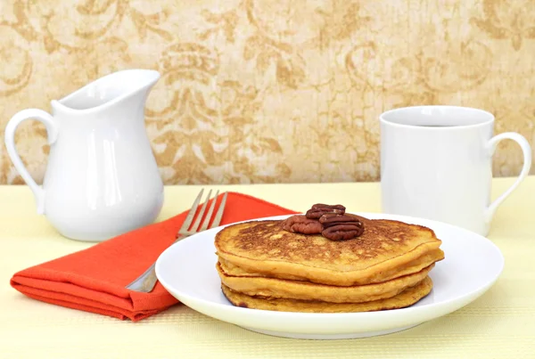 Pumpkin pancakes, pecans, and coffee. — Stock Photo, Image